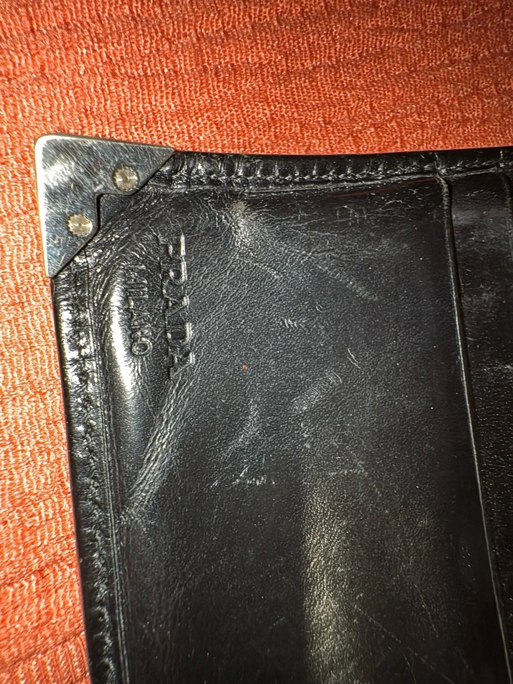 Prada Black Leather Men's Bi-Fold Wallet with Metal Corner
